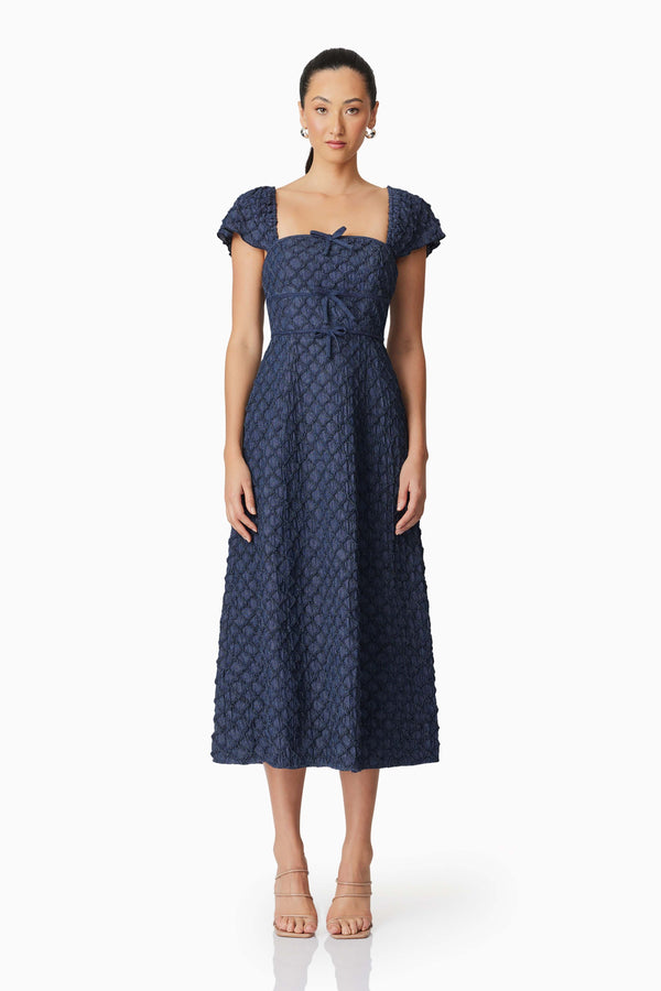 Brunette model wearing Keeley Midi Dress in Blue front shot