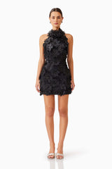 Brunette model wearing Cherry Blossom Mini Dress in Black front shot