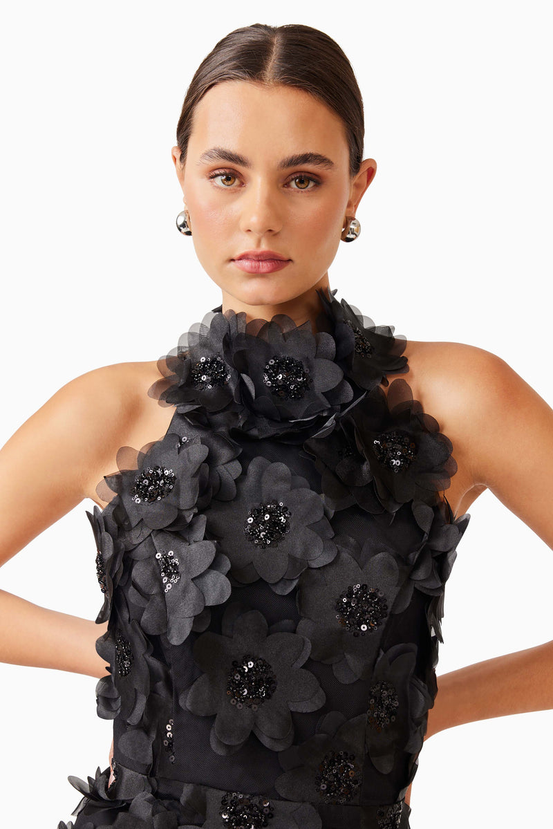 Brunette model wearing Cherry Blossom Mini Dress in Black detail shot