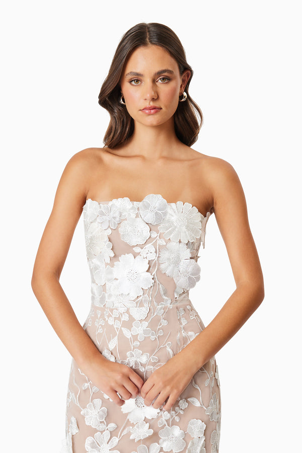model wearing Helena floral midi dress in white close up shot