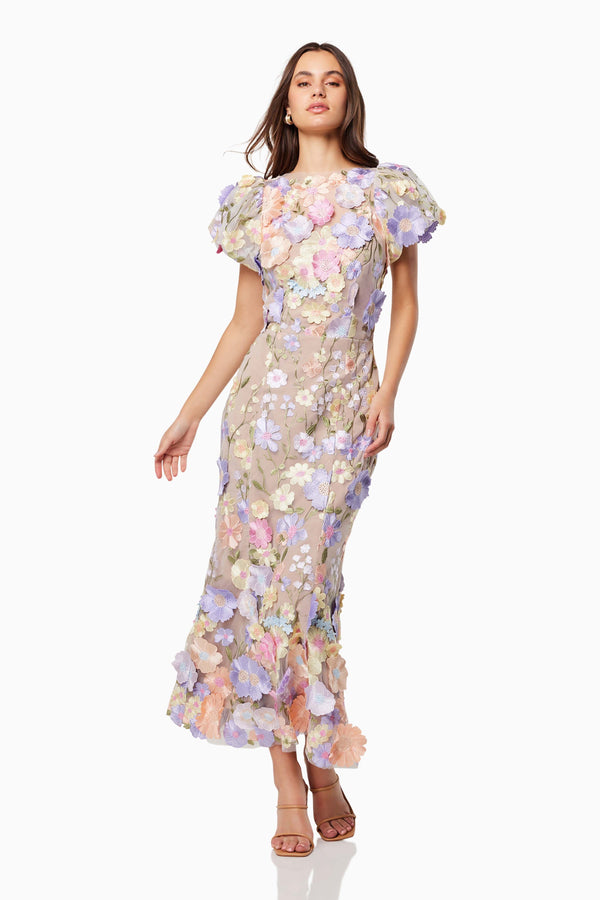 Brunette model is wearing Astraea 3D Lace Maxi Dress in Purple posed shot