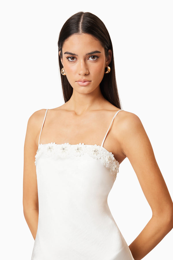Brunette model wearing Clarissa Midi Dress In White close up shot