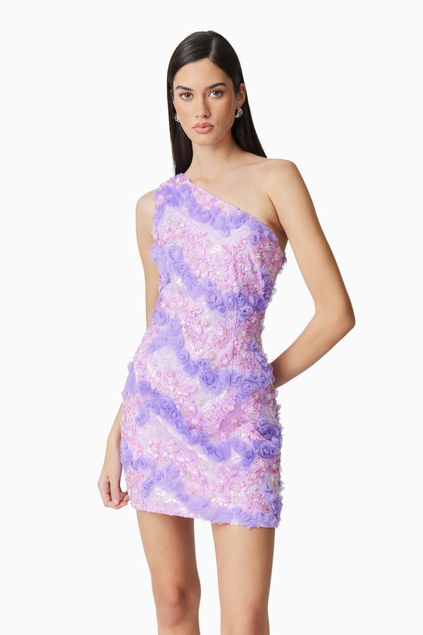 Brunette model wearing the Vonni One Shoulder Mini Dress in Purple close up shot